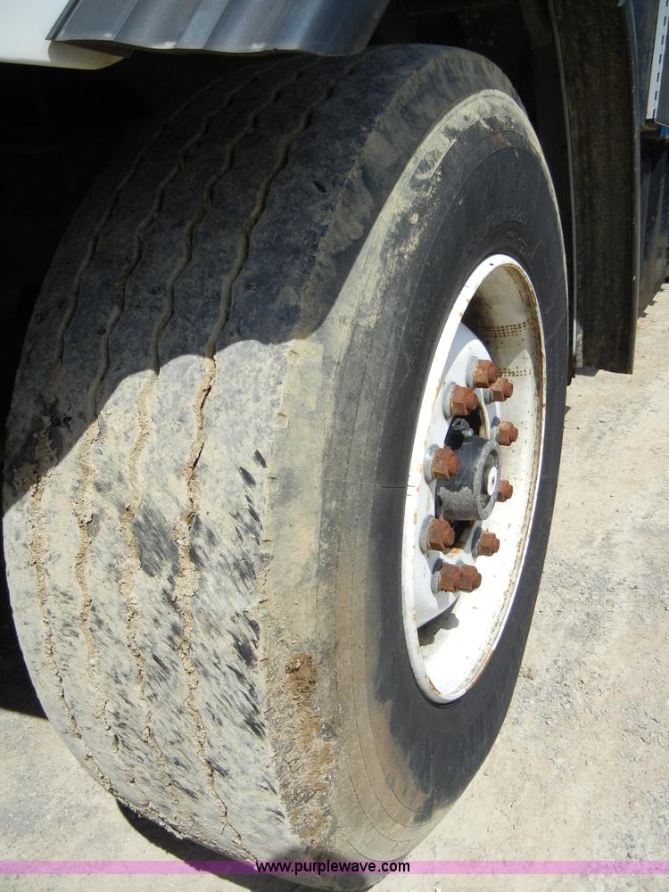 image for item F7518 2003 Sterling L7500 semi truck with Vac-Con system