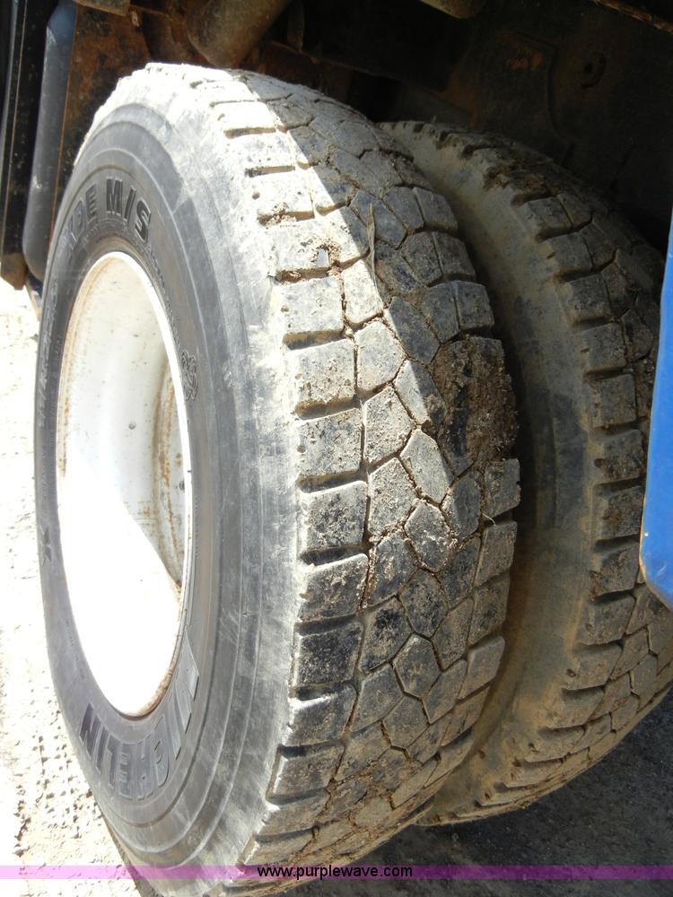 image for item F7518 2003 Sterling L7500 semi truck with Vac-Con system