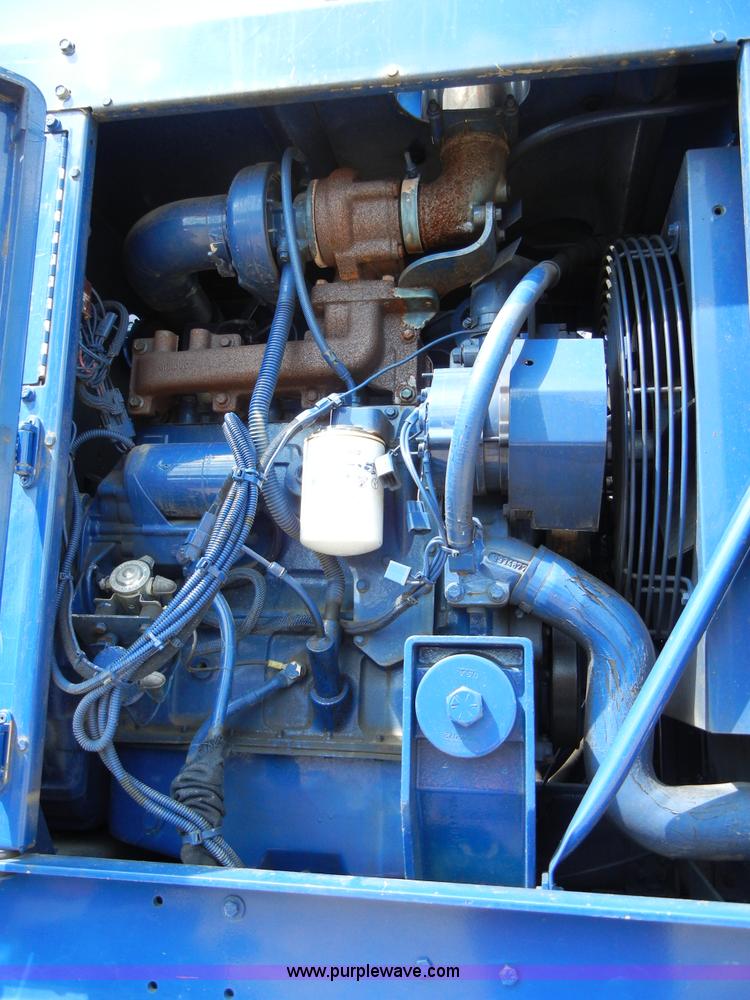 image for item F7518 2003 Sterling L7500 semi truck with Vac-Con system