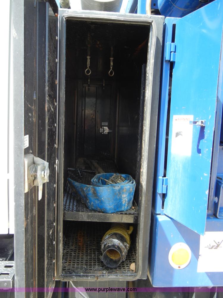 image for item F7518 2003 Sterling L7500 semi truck with Vac-Con system