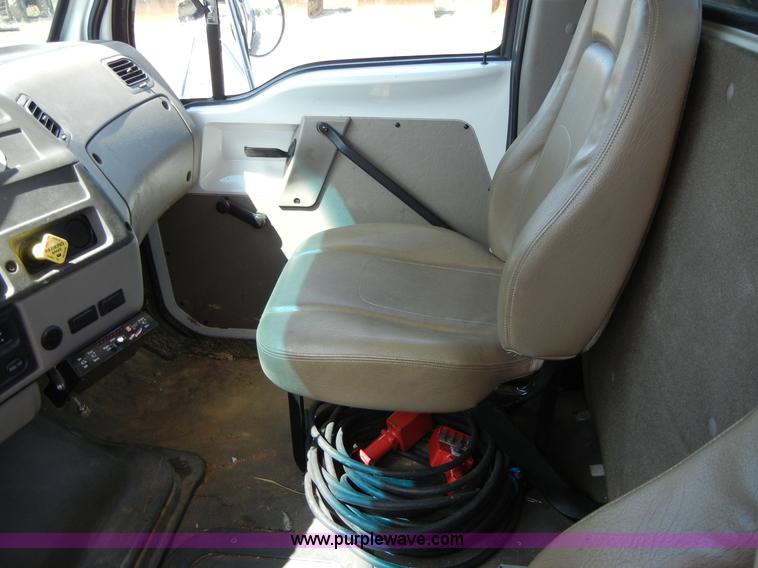 image for item F7518 2003 Sterling L7500 semi truck with Vac-Con system