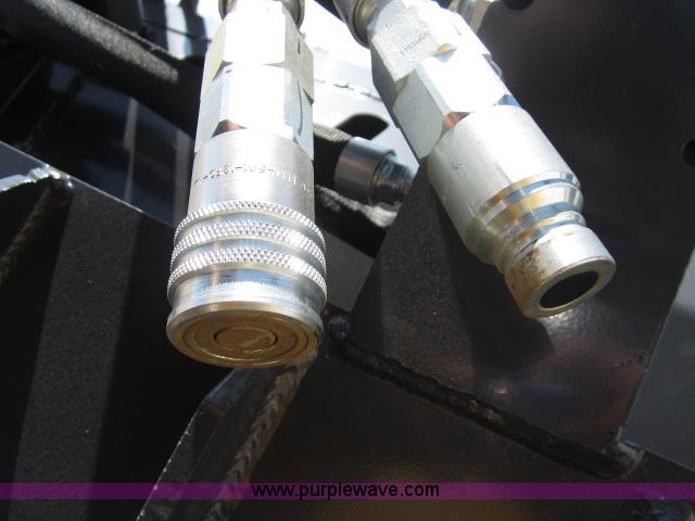 image for item I9788 2012 FFC Rock Hound auto rake skid steer attachment