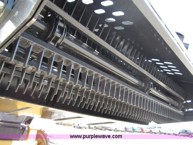 image for item I9788 2012 FFC Rock Hound auto rake skid steer attachment