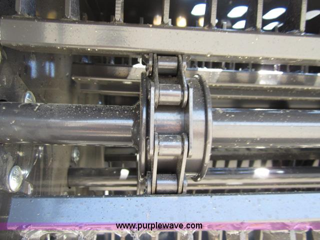 image for item I9788 2012 FFC Rock Hound auto rake skid steer attachment