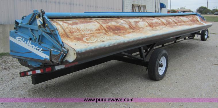 image for item D5678 1995 Shelbourne Reynolds CX84 28' stripper header