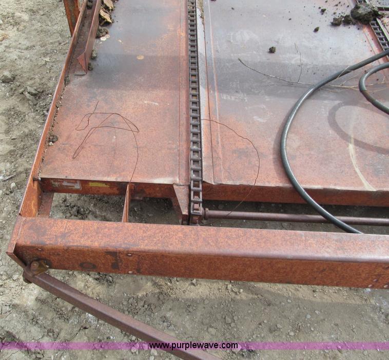 image for item E5548 Farm Hand bale accumulator