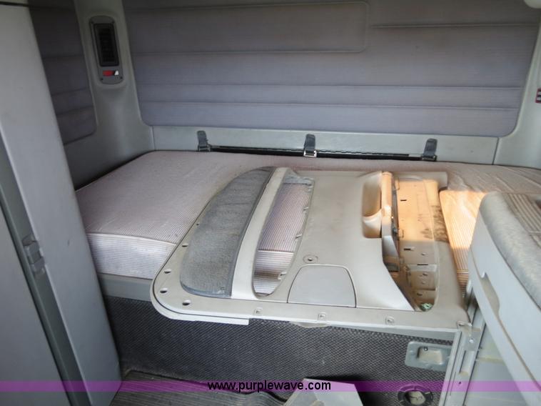 image for item B4503 1998 Freightliner FLC120 semi truck