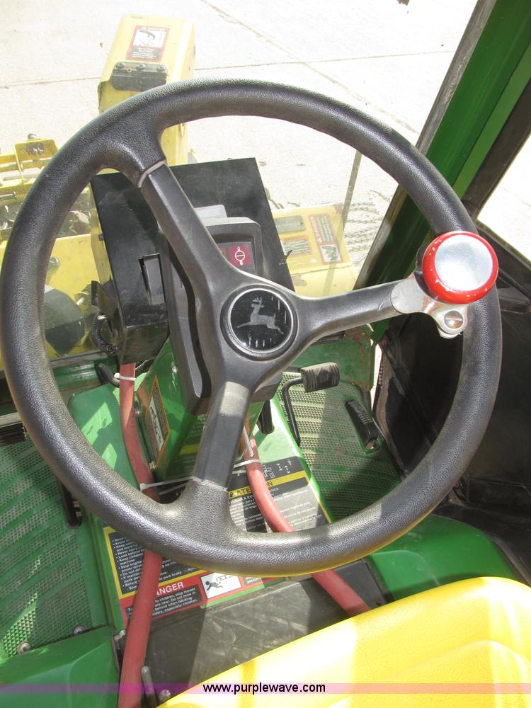 image for item B5227 2003 John Deere F725 front mount snow thrower/mower