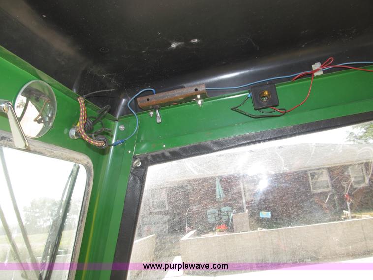 image for item B5227 2003 John Deere F725 front mount snow thrower/mower