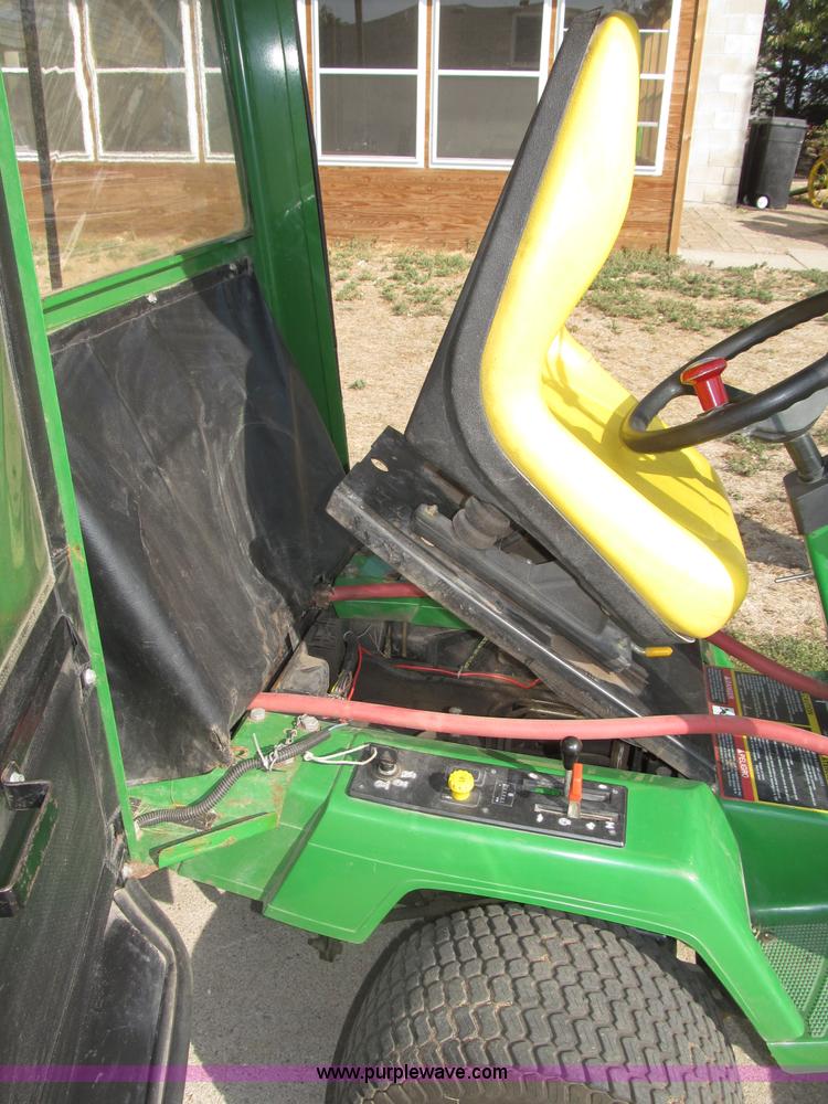 image for item B5227 2003 John Deere F725 front mount snow thrower/mower