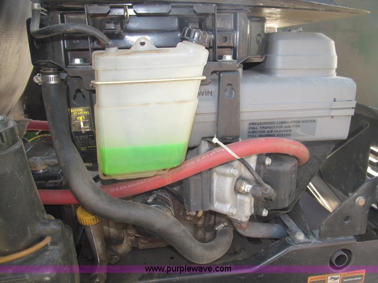 image for item B5227 2003 John Deere F725 front mount snow thrower/mower