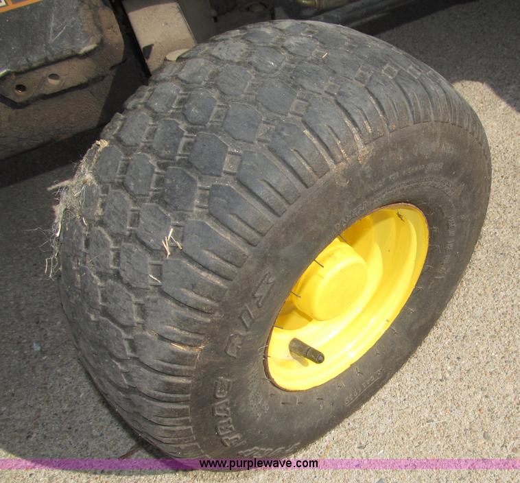 image for item B5227 2003 John Deere F725 front mount snow thrower/mower