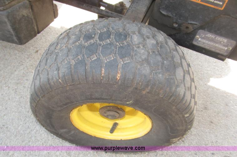 image for item B5227 2003 John Deere F725 front mount snow thrower/mower