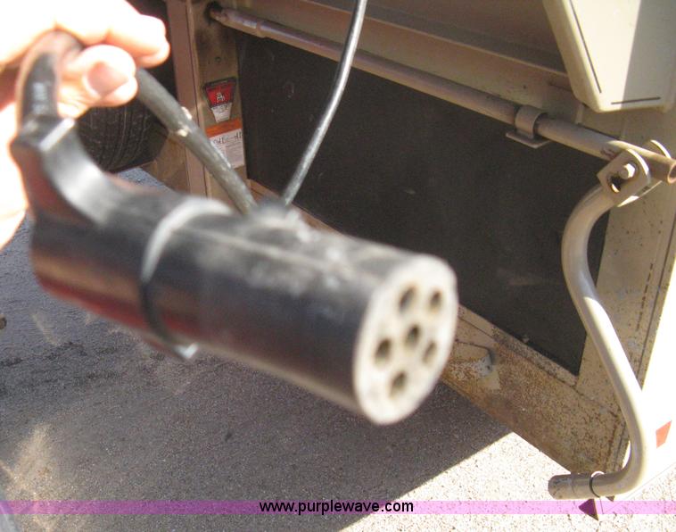 image for item B8146 2009 Circle D multi-purpose gooseneck flatbed trailer