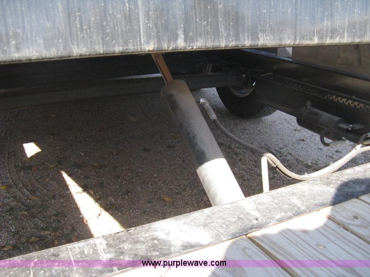 image for item B8303 2010 PJ tilt flatbed trailer