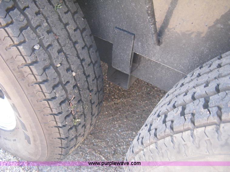 image for item B8303 2010 PJ tilt flatbed trailer