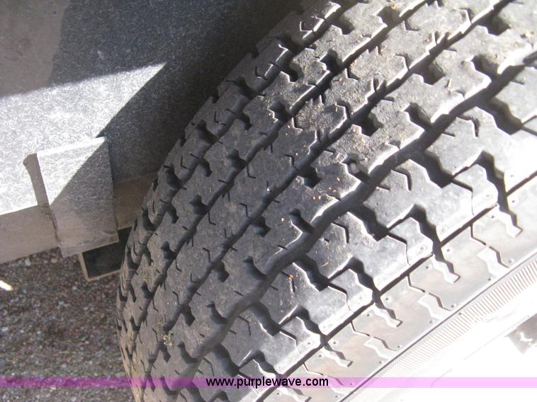 image for item B8303 2010 PJ tilt flatbed trailer