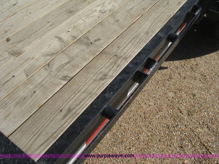 image for item B8303 2010 PJ tilt flatbed trailer