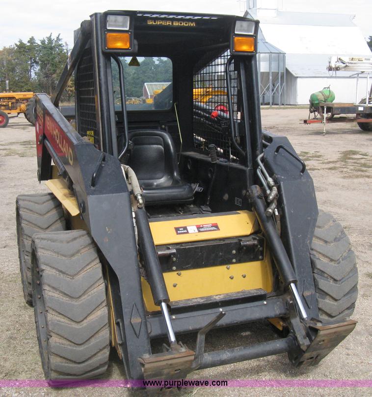 image for item B8305 1997 New Holland LX885 Turbo skid steer