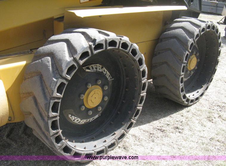 image for item B8305 1997 New Holland LX885 Turbo skid steer