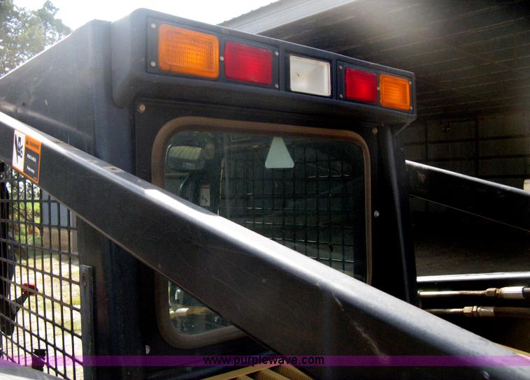 image for item B8305 1997 New Holland LX885 Turbo skid steer