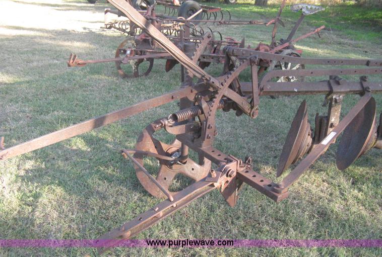 image for item M9023 John Deere M508A four bottom disk plow