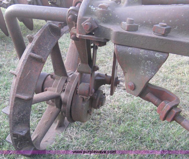 image for item M9023 John Deere M508A four bottom disk plow