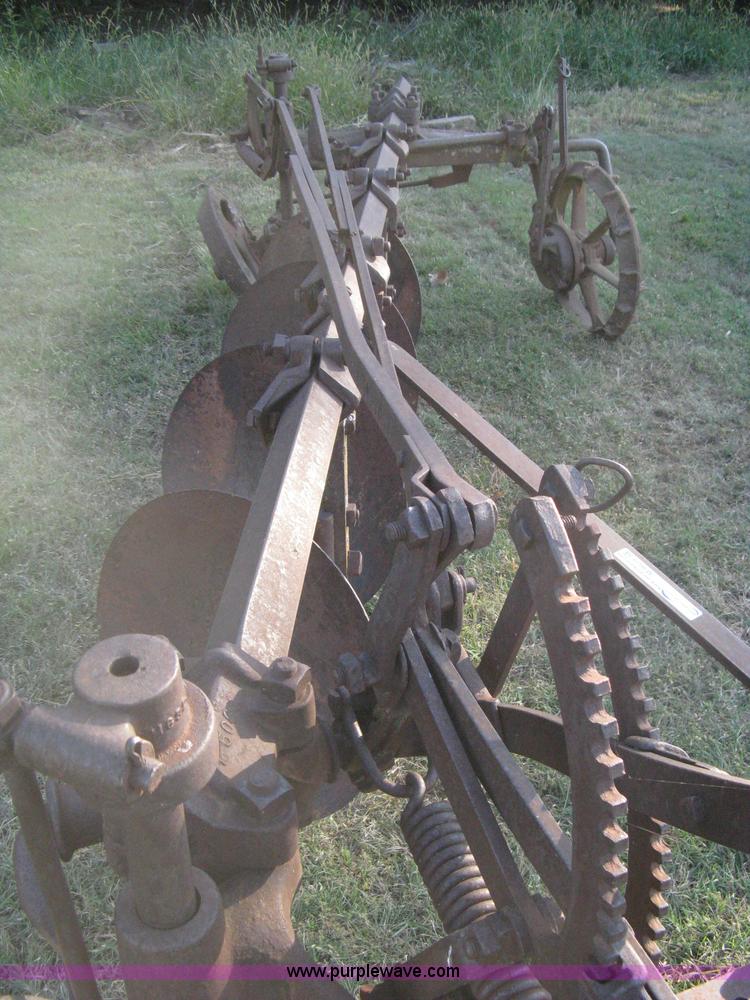 image for item M9023 John Deere M508A four bottom disk plow