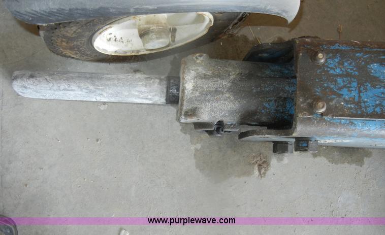 image for item F2605 Okada hydraulic breaker skid steer attachment