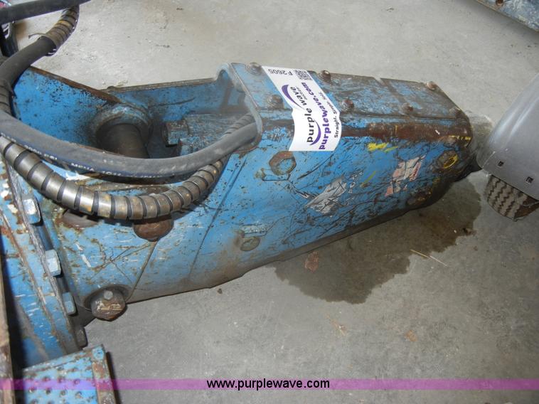 image for item F2605 Okada hydraulic breaker skid steer attachment