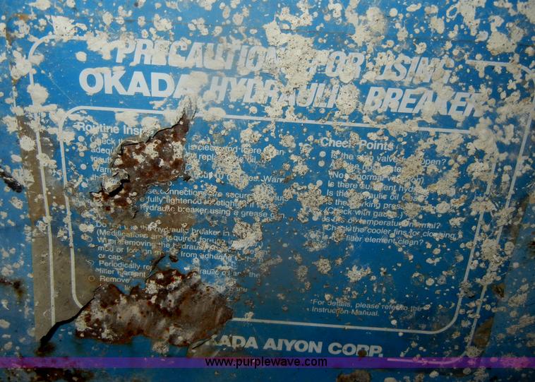 image for item F2605 Okada hydraulic breaker skid steer attachment