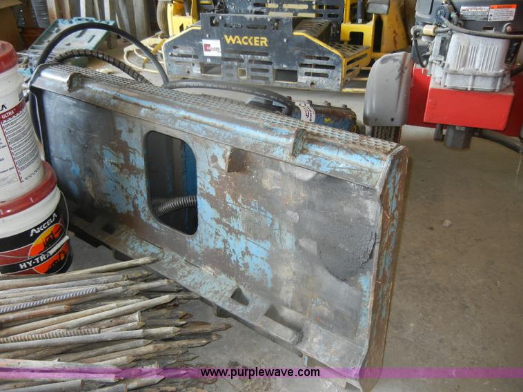 image for item F2605 Okada hydraulic breaker skid steer attachment