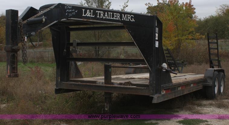image for item F2673 2002 L & L flatbed gooseneck trailer