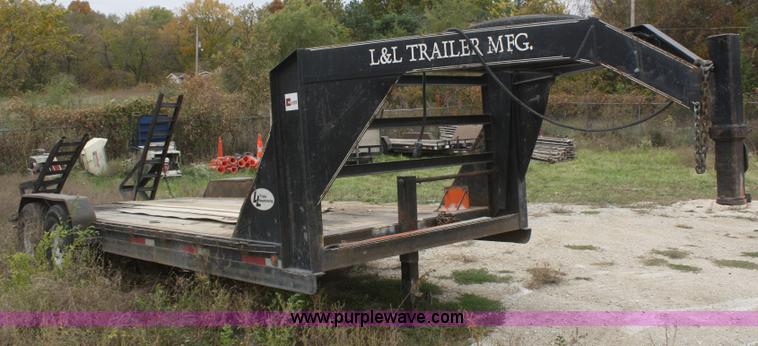 image for item F2673 2002 L & L flatbed gooseneck trailer