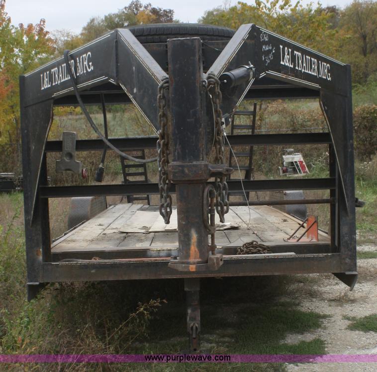 image for item F2673 2002 L & L flatbed gooseneck trailer