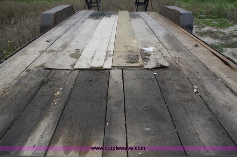 image for item F2673 2002 L & L flatbed gooseneck trailer