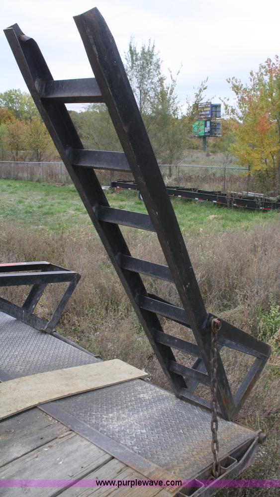 image for item F2673 2002 L & L flatbed gooseneck trailer