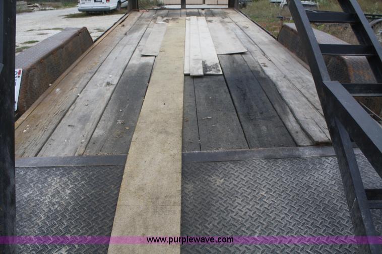 image for item F2673 2002 L & L flatbed gooseneck trailer