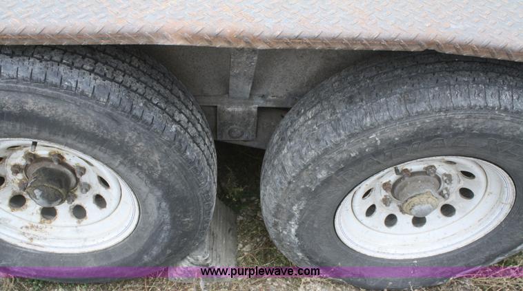 image for item F2673 2002 L & L flatbed gooseneck trailer