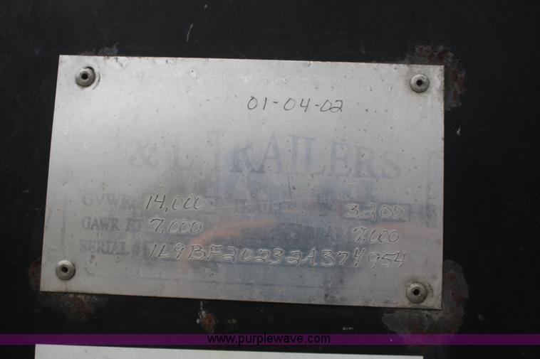 image for item F2673 2002 L & L flatbed gooseneck trailer