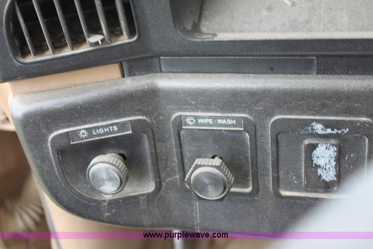 image for item E4221 1988 Ford F350 XL flatbed pickup truck