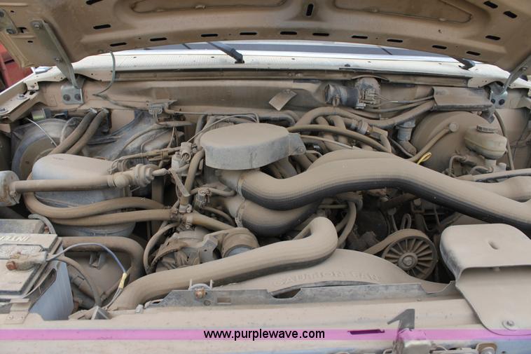 image for item E4221 1988 Ford F350 XL flatbed pickup truck