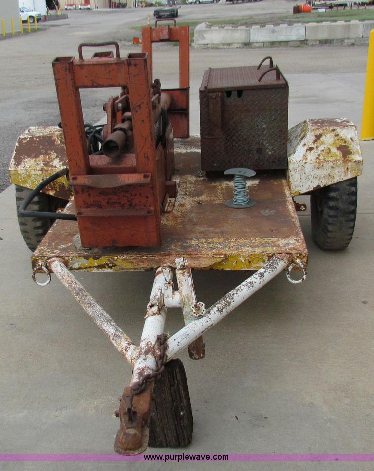 image for item E8139 Ditch Witch trailer mounted hydraulic pipe pushing jack
