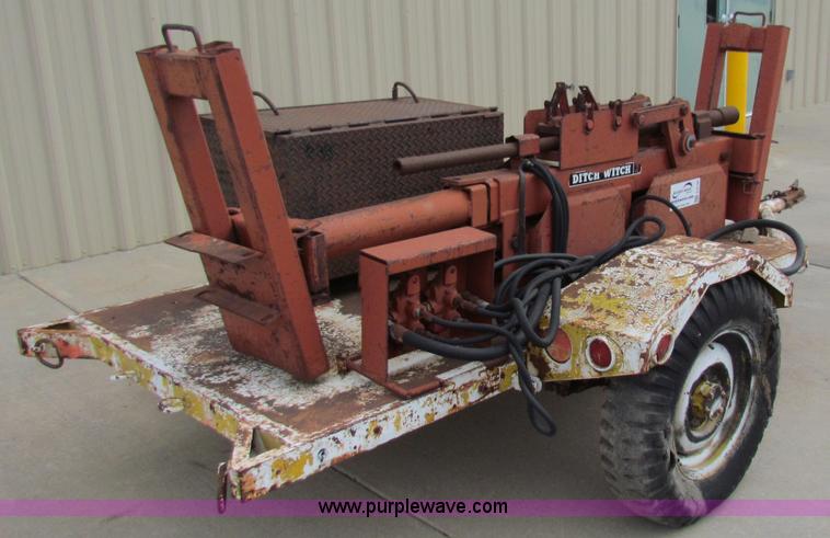 image for item E8139 Ditch Witch trailer mounted hydraulic pipe pushing jack