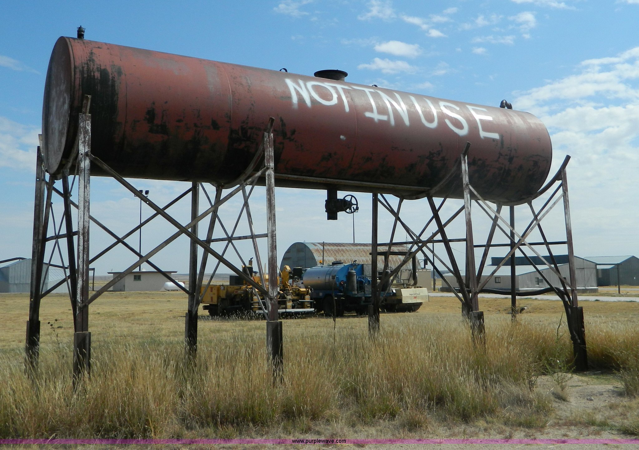 Bulk oil storage tank and stand in Atwood, KS Item S9025 sold Purple Wave