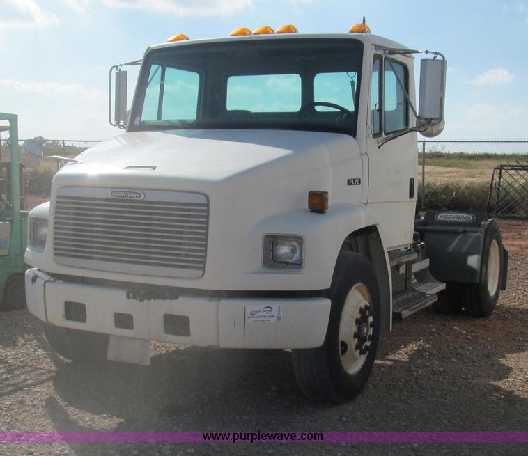 image for item F3054 1997 Freightliner FL70 semi truck