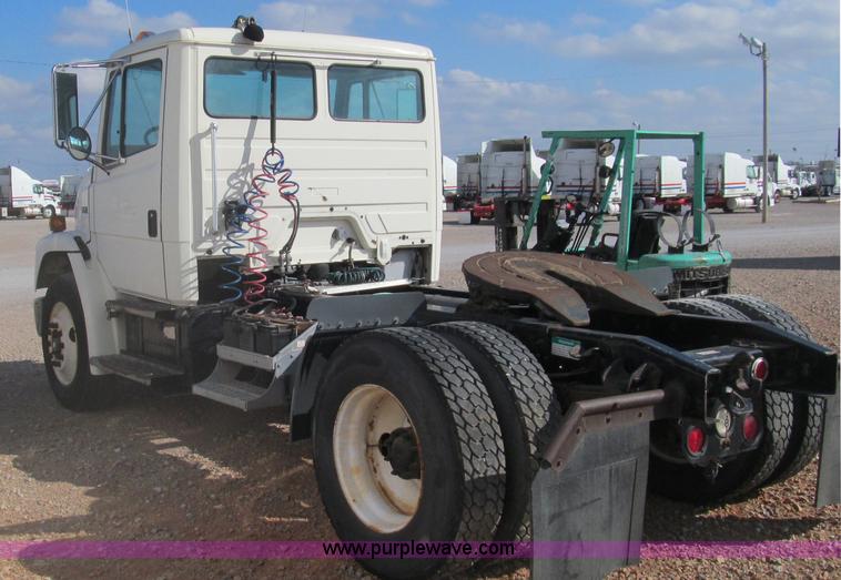 image for item F3054 1997 Freightliner FL70 semi truck
