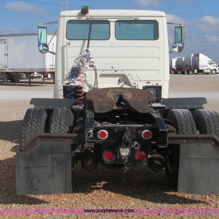 image for item F3054 1997 Freightliner FL70 semi truck