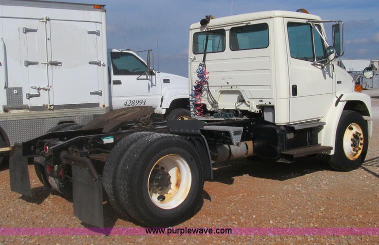 image for item F3054 1997 Freightliner FL70 semi truck