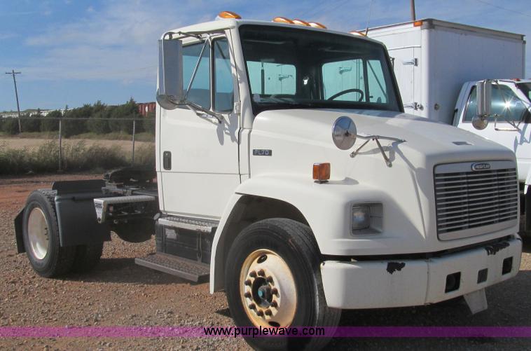 image for item F3054 1997 Freightliner FL70 semi truck